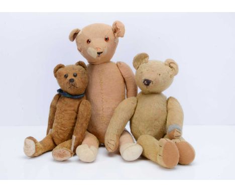 Three 1920-30s teddy bears,  a British blonde mohair, with black stitched nose, swivel head, jointed limbs (legs loose) pigeo