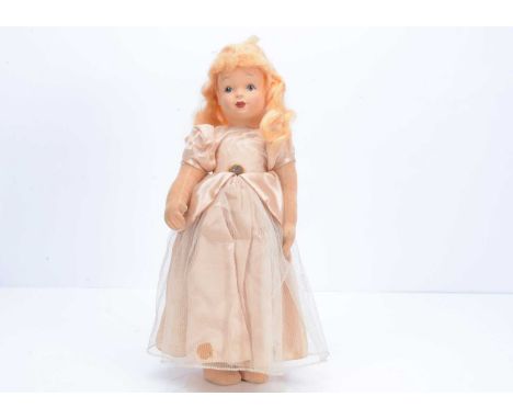 A Chad Valley Cinderella doll, late 1930s,  with pressed felt face, painted blue eyes, long blonde mohair wig, swivel head, c