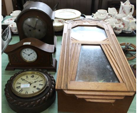 Two wall clocks, two mantel clocks plus a barometer