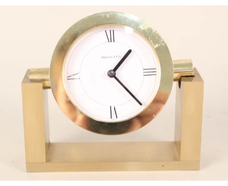 A brass cased desk clock, dial marked Tiffany &amp; Co