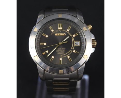 A gents Seiko Kinetic Titanium 100m wristwatch with date aperture, in original box, original papers and spare links