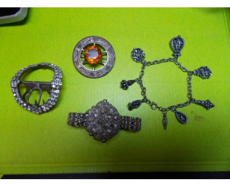 WHITE METAL FILLIGREEY FLORAL SPRAY BRACELET, WHITE METAL BRACELET AND A CELTIC CAIRNEGORN DISC BROOCH AND STEEL AND PARVEY S