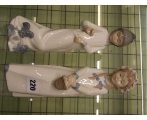 TWO NAO FIGURES GIRLS IN NIGHTDRESSES WITH PUPPY DOG AND A BASKET 