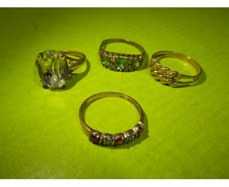 9CT AQUA MARINE RING A/F, A 9CT KEEPER RING, A 9CT RUBY STONE RING AND A 9CT CZ SOLITAIRE