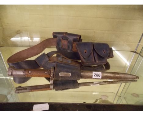 WORLD WAR II BAYONET IN SCABBARD ON LEATHER BELT WITH AMMUNITION POUCHES