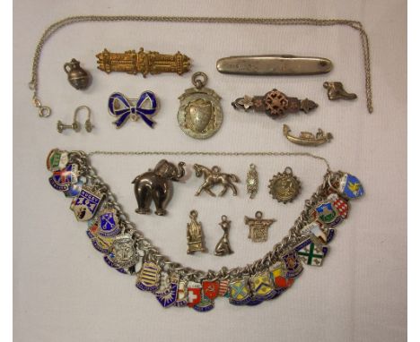 BAG CONTAINING SILVER ENAMEL CHARM BRACELET, SILVER PENDANT, BAR BROOCH AND A NOVELTY ELEPHANT CHARM