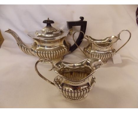 BIRMINGHAM SILVER THREE PIECE BACHELOR TEA SERVICE WITH GADROONED DECORATION