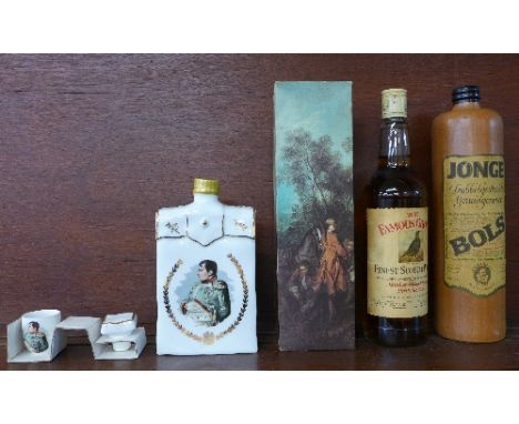 Four bottles; Cognac Otard in a Limoges decanter, with carrying case and shot, The Famous Grouse, J & B and Jonge Bols