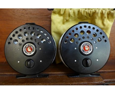 Two Ryobi 357MG Super Light Magnesium fishing reels, with soft cases