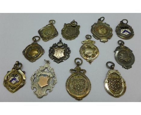 Twelve silver fob medals including Abbeville Garrison Cup Tie, B.E.F., 1916, 75g