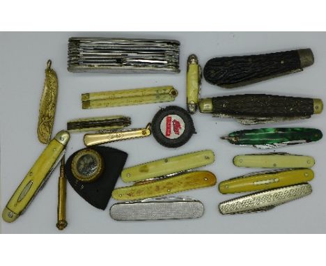 Fifteen pocket, pen and fruit knives including one ivory, advertising, combination and others, a six inch ivory and brass fol