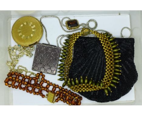 A beaded evening bag, a Gucci handbag mirror, vintage jewellery, a Stratton compact, etc.