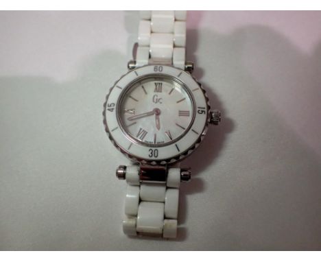 Guess collection (GC) ladies wristwatch on a ceramic bracelet. UK P&amp;P Group 1 (£16+VAT for the first lot and £2+VAT for s