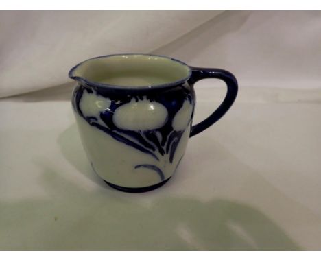 Macintyre Florian Ware small jug (A/F), H: 6.5cm. UK P&amp;P Group 1 (£16+VAT for the first lot and £2+VAT for subsequent lot