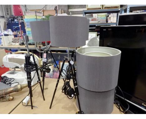 Three occasional table tripod lamps, with grey shades and two further room shades. All electrical items in this lot have been