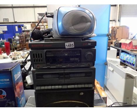 Arbiter Karaoke 'Track 50' with mic and a Tronic KH-868 stereo. All electrical items in this lot have been PAT tested for saf