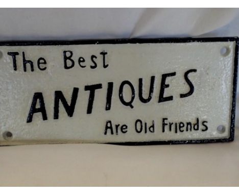 Cast iron The Best Antiques Are Old Friends sign, W: 25 cm. UK P&amp;P Group 2 (£20+VAT for the first lot and £4+VAT for subs