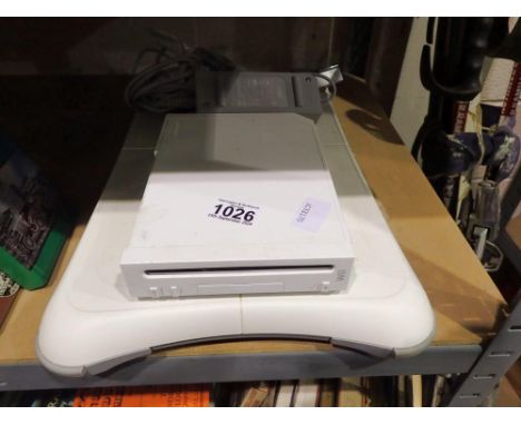 Nintendo Wii with sensor, PSU, connectors and board. All electrical items in this lot have been PAT tested for safety and hav