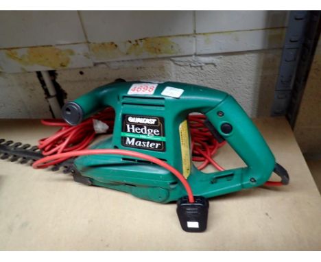 Qualcast 380 Hedge Master and five cast iron plant signs. All electrical items in this lot have been PAT tested for safety an