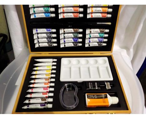 Wooden case, with 35 unused acrylic paints. UK P&amp;P Group 2 (£20+VAT for the first lot and £4+VAT for subsequent lots)
