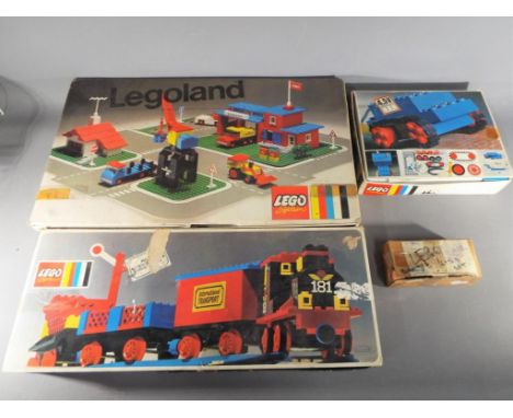 Lego - Three boxed vintage Lego sets with a home made box containing Lego parts. All items are in Playworn condition and are 