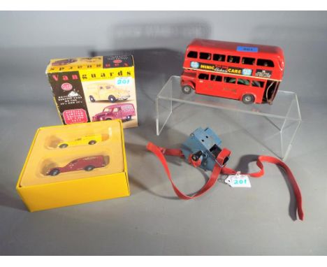 Triang Minic / Lone Star / Vanguard - a Triang Minic tin-plate London Bus, a Lone Star roll ticket machine No 152 and a mint 