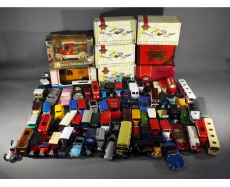 Matchbox, Lledo, Dinky, and Others - In excess of 60 unboxed diecast model vehicles in various scales. lot includes Matchbox 