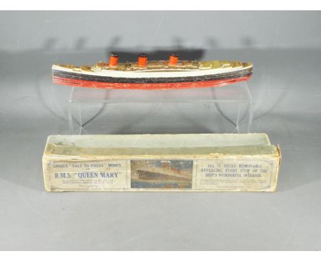 Chad Valley - A boxed Chad Valley "Take to Pieces" model of the RMS Queen Mary Liner. The model is assembled with flat card s