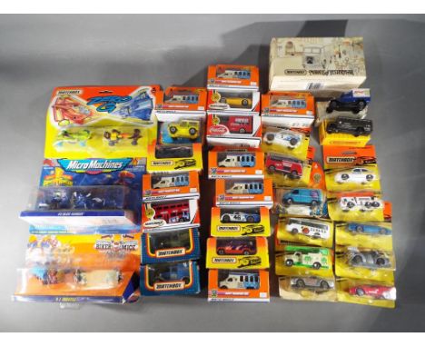 Matchbox; Micro Machines - 31 boxed / carded Matchbox diecast model vehicles predominately 1:64 scale with two Micro Machines