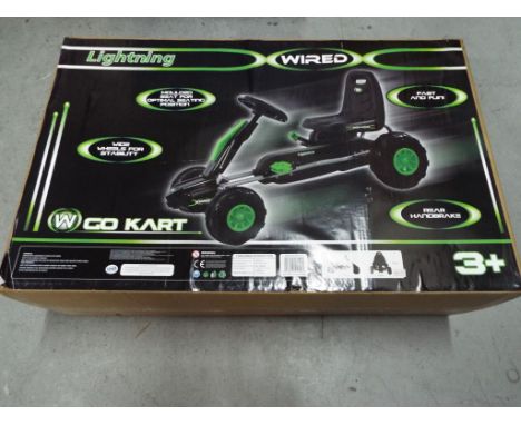 Go Cart - a boxed lighting wired Go Cart for ages 3+ with moulded seat, wide wheels Fast and Fun in factory sealed box