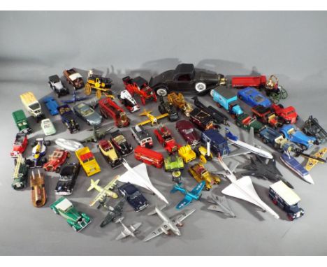 Corgi, Matchbox, Brumm, Dinky and others - In excess of 30 unboxed diecast model vehicles and aircraft in various scales. Lot