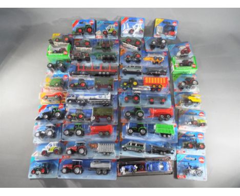 Siku - Approximately 38 diecast carded and boxed diecast model vehicles by Siku in various scales such as 1:72  and 1:87. Lot