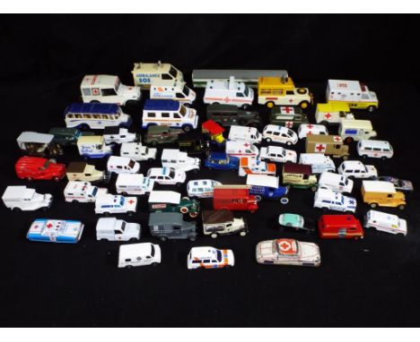 Corgi, Matchbox, Majorette, Lledo and others - In excess of 50 diecast and plastic model, predominately Ambulance vehicles. M