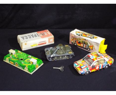 Jaya, Gescha and Other - Three vintage tinplate vehicles. Lot includes a Gescha (Germany) tinplate clockwork Tank in military