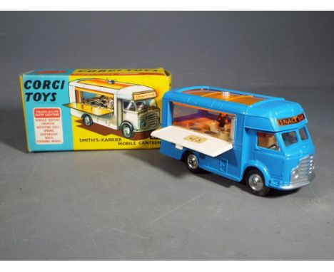 Corgi Toys - A boxed Corgi 471 Smiths Karrier Mobile Canteen 'Joe's Diner'. The model has a blue body, with spun hubs and sil