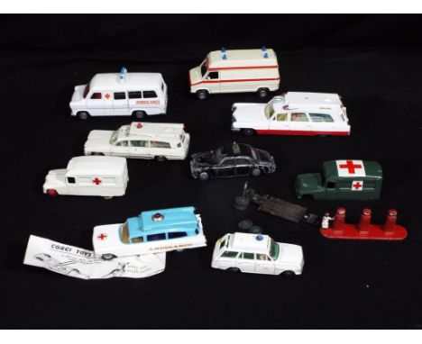 Dinky, Corgi, NZG - 9 unboxed diecast model vehicles predominately Ambulances with an unboxed Lesney Petrol Pump Attendant. L