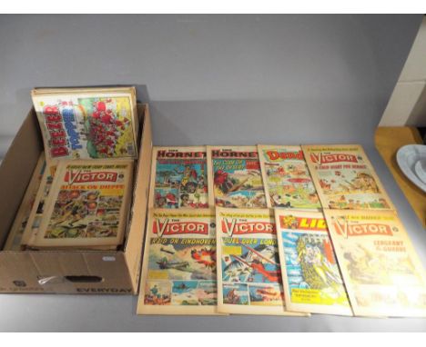 A collection of vintage comics from the 1960's and later to include Topper, The Beano, Beezer, The Hornet, The Dandy, Victor 