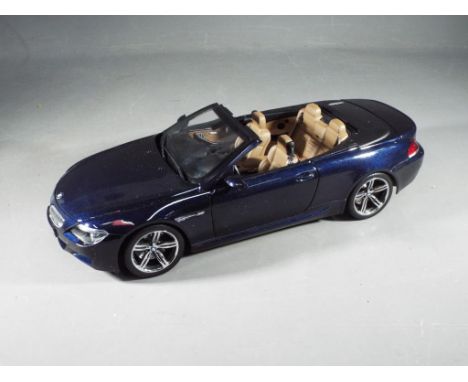 Kyosho - A boxed 1:18 scale Kyosho 08704BL BMW M6 Convertible in blue. The model appears to be in Mint condition in a Very Go