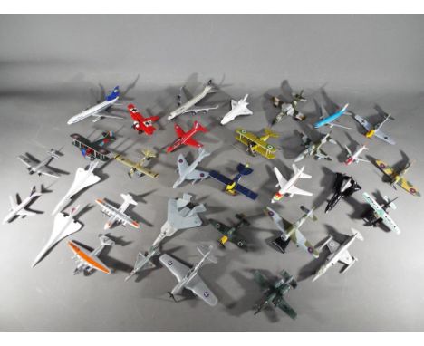 Corgi, Schabak, Matchbox, Majorette and others - In excess of 30 unboxed diecast model aircraft in various scales. Lot includ