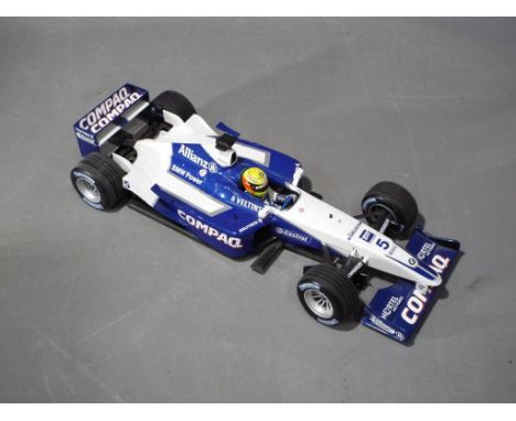 Minichamps - A boxed 1:18 scale Minichamps Williams F1 BMW FW23 - Ralph Schumacher. The model appears to be in Mint condition