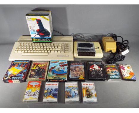 Commodore - A Commodore 64 personal computer with tape deck, Cheetah Mach I+ joystick (boxed) and a quantity of game cassette