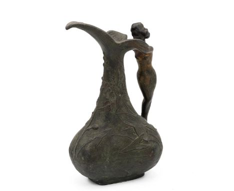 Bronze Art Nouveau jug with impressed mark 'JOUANT', the body depicting fish in a pond with plants above, the handle in the f