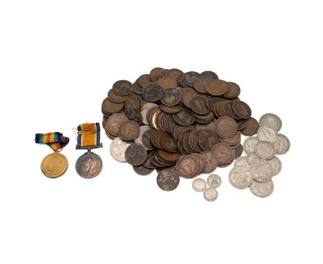 A collection of miscellaneous coins including various pre 1947 crowns, pennies and two WWII medal awarded to "9959 PTE F H WI