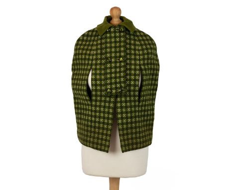 A 1960's Welsh tapestry child's cape, lined with original tag 'Made in Wales CORGI 100% wool', drop 63cm.