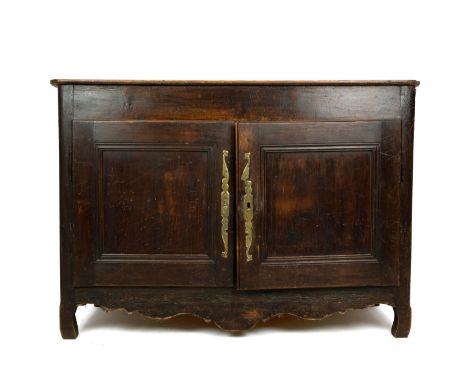 19th Century French/Dutch Pine dresser base. Shaped feet and skirt, two doors with brass lock plate&nbsp; open to reveal fixe