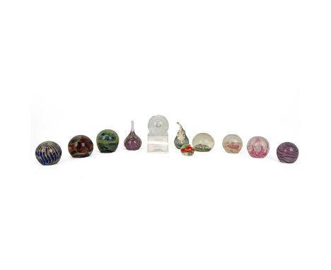 A collection of 11 paperweights, including Caithness, including a boxed 'Silver Rain', Mdina and various others.