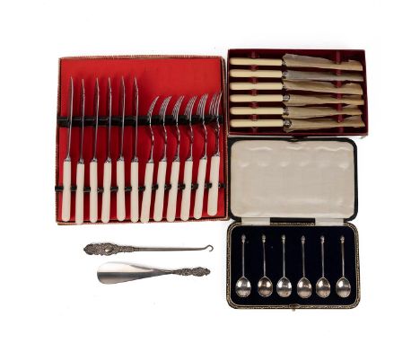 Set of 6 cased silver coffee spoons 41.5 grams; a set of 6 knives and; a set of 6 fish eaters and; a silver handled button ho