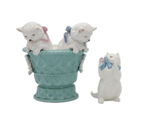 Minton, in the manner of, retailed by T Goode &amp; Co (printed mark to base), kittens in a basket vase (H 19.5cm), together 