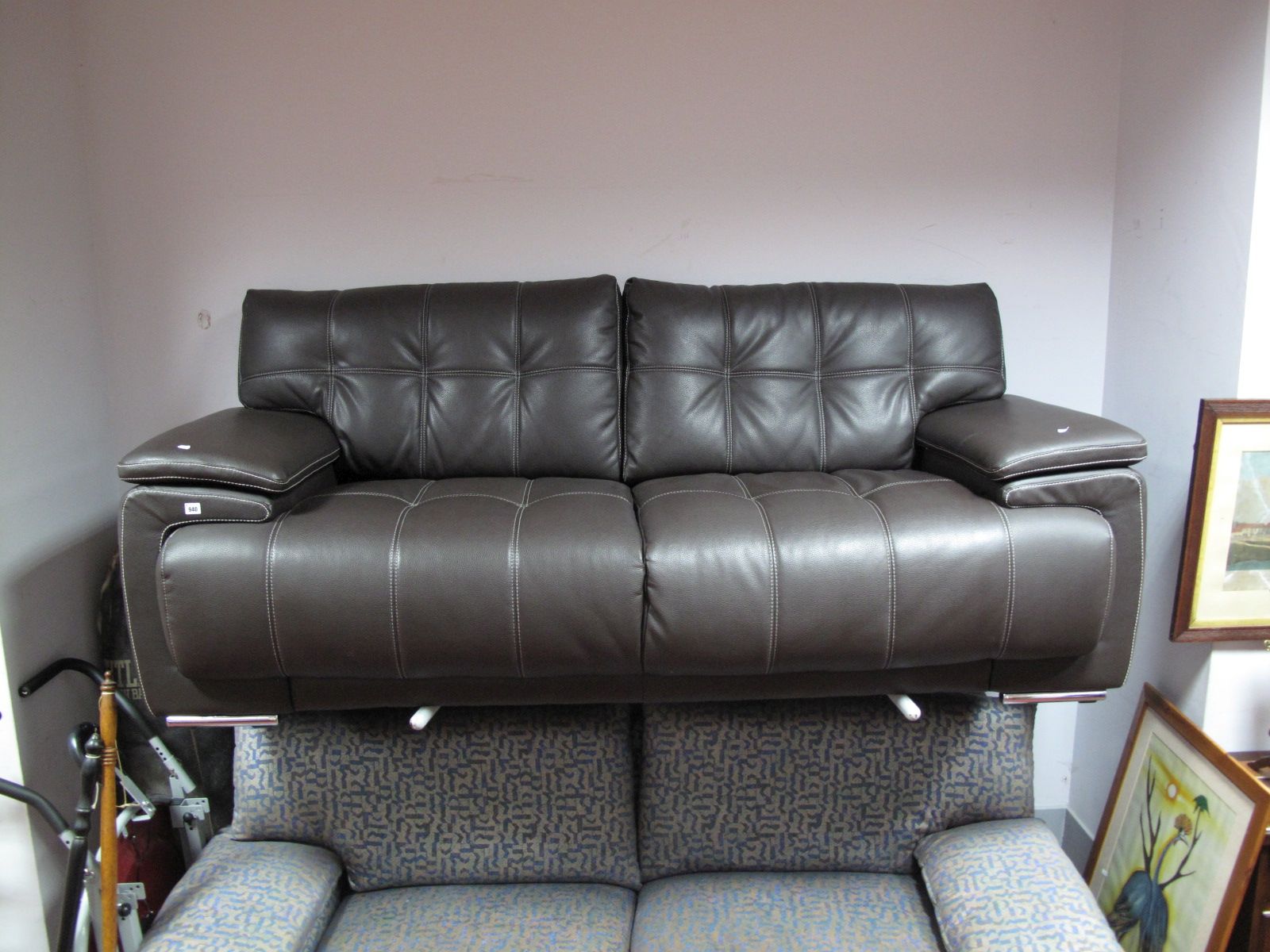 An Infinity Endurance Three Seater Sofa in dark brown leather