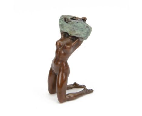 Bronze figure, modelled as a nude female figure removing her shirt, H17cm